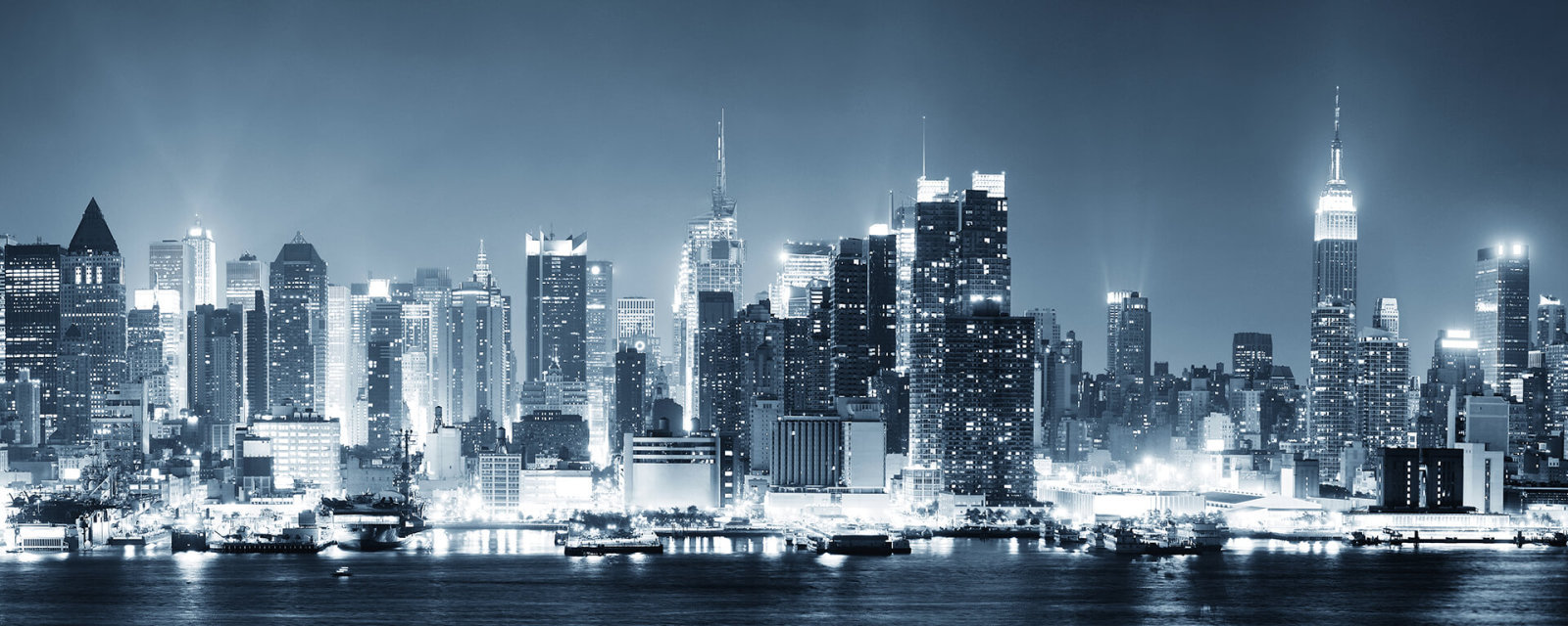 Leinwandbild NEW YORK BEI NACHT - blau-grau - 100x40 cm